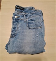 Blugi cu gauri 34 (US)