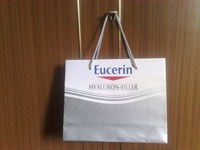 2 pungi de hartie-GLOW si EUCERIN