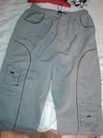 Pantaloni trei sferturi