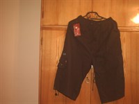 Pantaloni pana la genunchi
