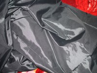 Bucata de material textil negru subtire lucios