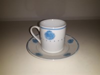 Cescuta de cafea cu farfurie